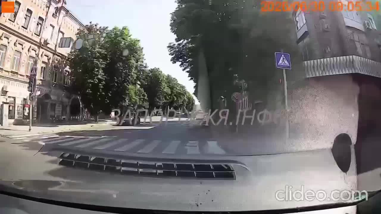 Video thumbnail: Dashcam records strike metres from moving car in central Zaporizhzhia during attack