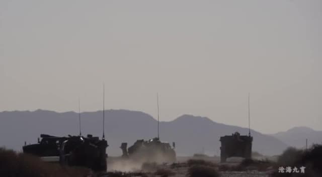 Video thumbnail: Chinese PCL-171 Self-Propelled Howitzers During Field Training